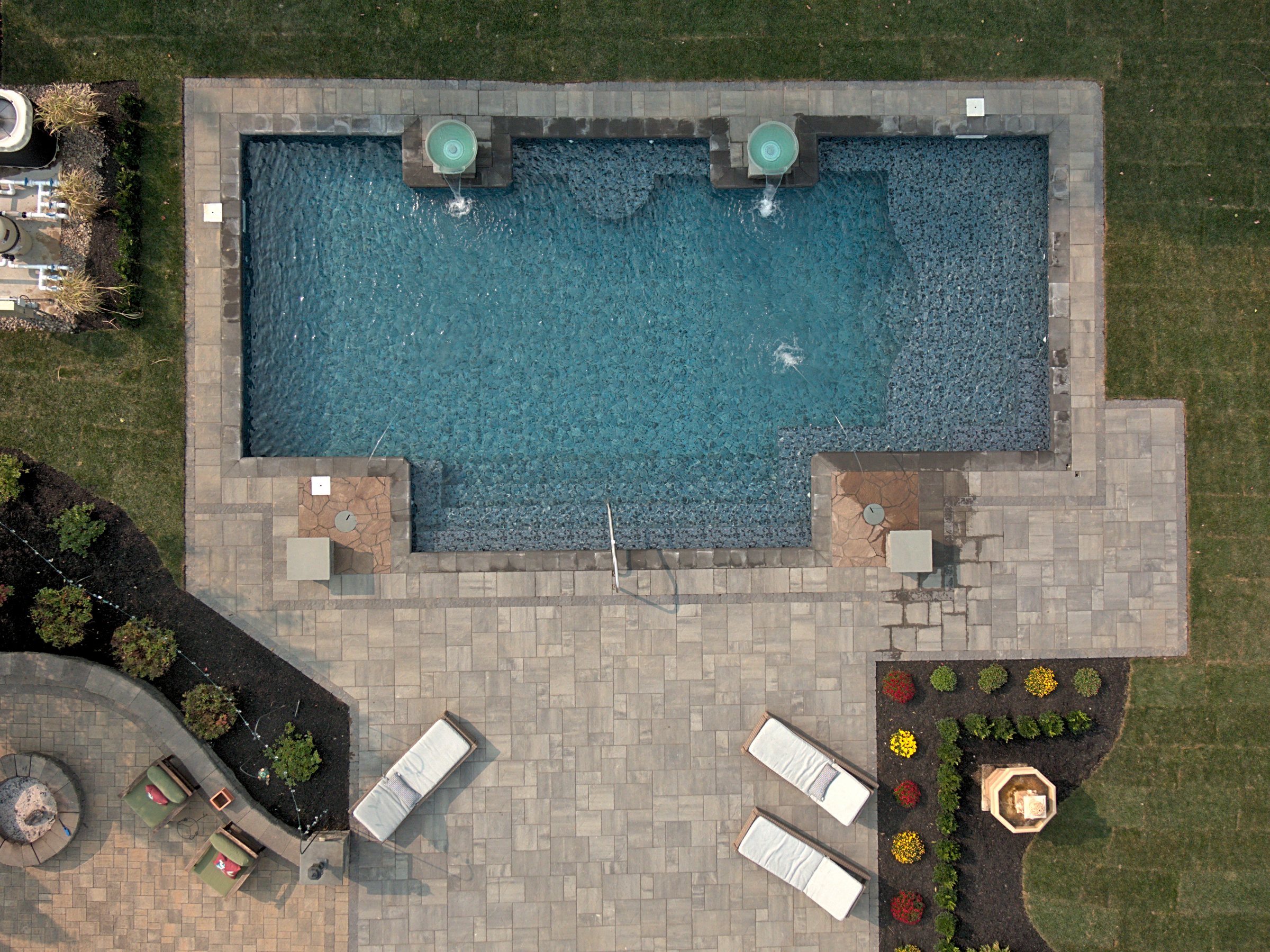 Radiant inground pool installed in a backyard